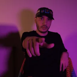 Molotof pointing at the camera